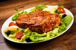 Raw, marinated pork and vegetables