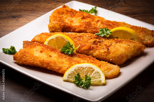 Photo: Fish dish - fried fish fillet with vegetables Fish dish - fried fish fillet with vegetables