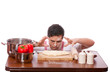 Sad man try to cooking.