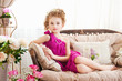 Little Girl Lying On The Sofa