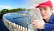 Plumber in uniform repairing old pipeline. Collage