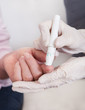 Doctor Checking Blood Sugar Level