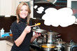 Photo: Attractive blond woman cooking in the kitchen with thought cloud Attractive blond woman cooking in the kitchen with thought cloud