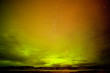 Surreal Northern Lights with clouds and stars sky