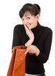 surprised young woman with gift bag