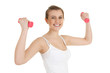 cheering teenage girl working out with small dumbbells