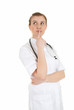 thoughtful female doctor looking up