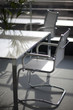 A chair and a table in an office space