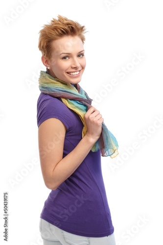Photo: Ginger woman smiling over shoulder Ginger woman smiling over shoulder