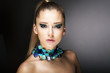 Luxury. Gorgeous Trendy Woman with Turquoise Necklace