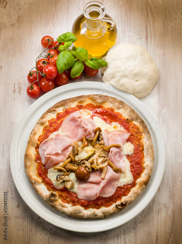 Photo: pizza with ham and mushroom pizza with ham and mushroom