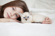 Child and kitten