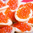 Tartlets with red caviar