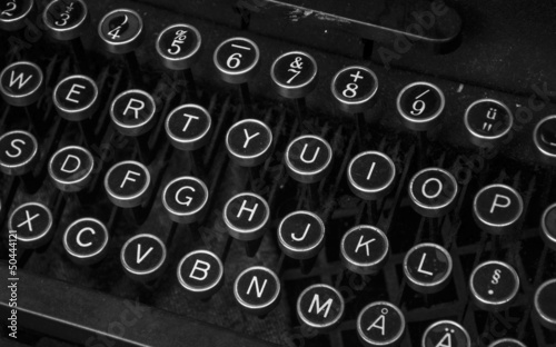 Photo: Antique typewriter keybaord closeup Antique typewriter keybaord closeup