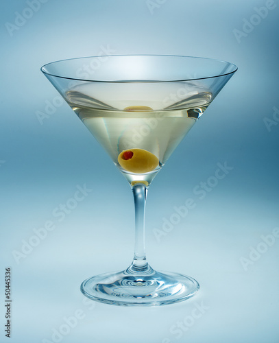Photo: Martini with olive isolated. vermouth Martini with olive isolated. vermouth