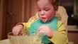 Boy is having dinner.