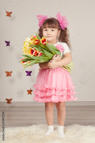 Photo: Portrait of girl with tulips Portrait of girl with tulips