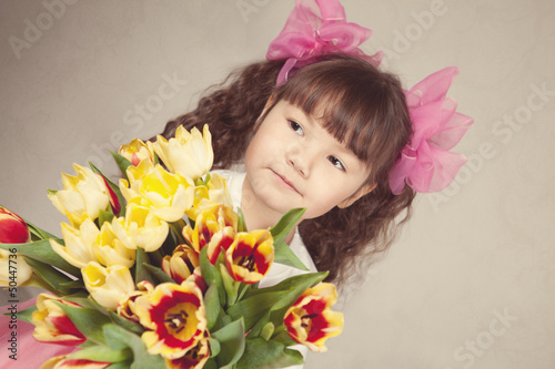 Photo: Portrait of girl with tulips Portrait of girl with tulips