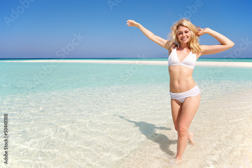 Photo: Woman Enjoying Beach Holiday Woman Enjoying Beach Holiday