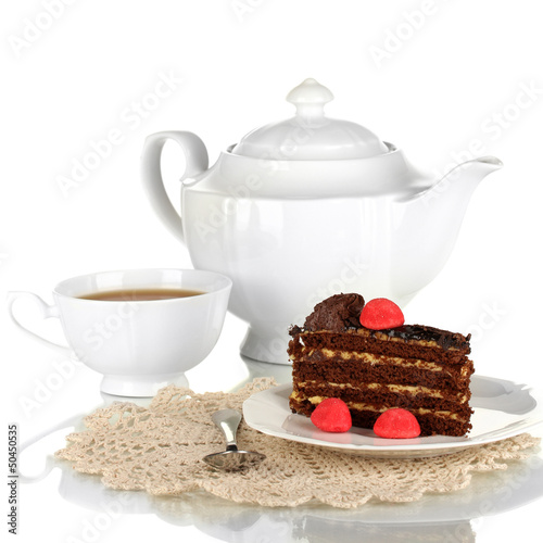 Photo: Teapot, cup of tea and delicious cake isolated on white Teapot, cup of tea and delicious cake isolated on white