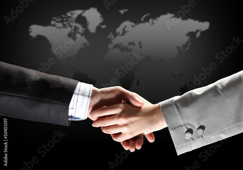 Photo: image of business handshake image of business handshake