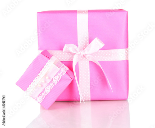 Photo: Gift boxes, festive wrapping isolated on white Gift boxes, festive wrapping isolated on white