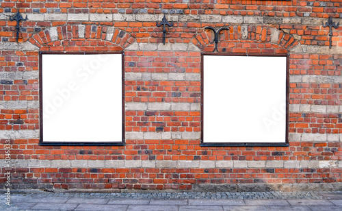 Photo: Empty billboards on brick wall Empty billboards on brick wall