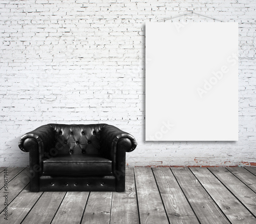 Photo: chair and poster on wall chair and poster on wall