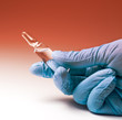 Ampule of antibiotic in a hand