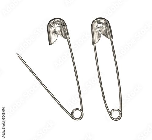 Photo: Safety pin isolated on white background Safety pin isolated on white background
