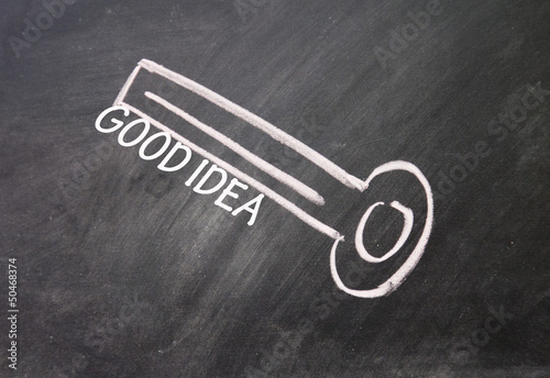 Photo: abstract good idea key drawn with chalk on blackboard abstract good idea key drawn with chalk on blackboard