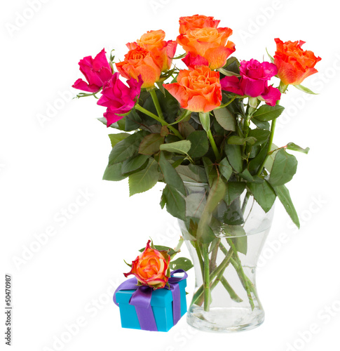 Photo: bouquet of orange roses in vase and gift box bouquet of orange roses in vase and gift box