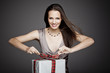 Pretty girl tying present