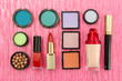 Decorative cosmetics on pink background