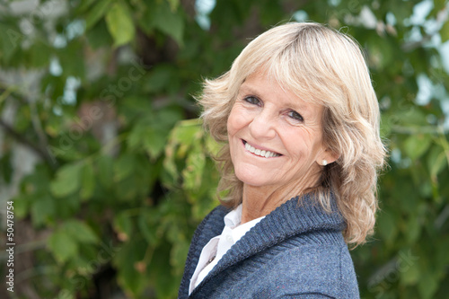 Photo: portrait of a happy senior woman portrait of a happy senior woman