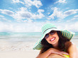 Woman relaxing on the beach.