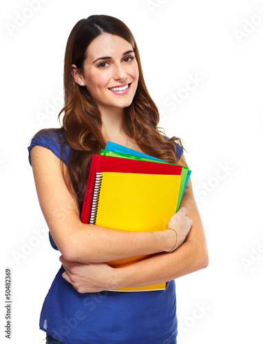 Photo: Young woman student with a book. Young woman student with a book.