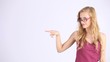 beautiful smiling girl with finger indicating