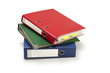 red green and blue Office folders isolated on white