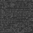 Hand writing physics formula on seamless blackboard