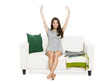 Foto: Beautiful woman relaxing on a sofa Beautiful woman relaxing on a sofa