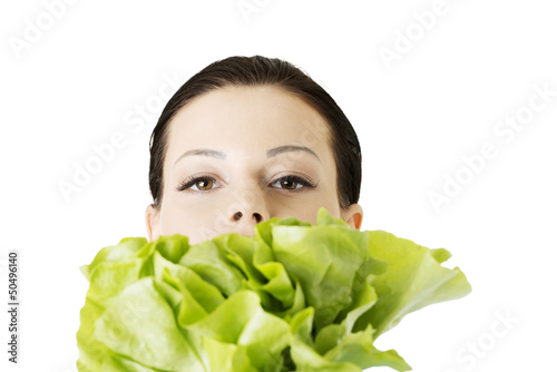 Photo: Portrait of attractive caucasian woman with salat Portrait of attractive caucasian woman with salat