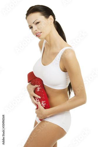 Photo: Woman with belly pain Woman with belly pain