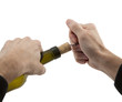 man's hands opens bottle of wine