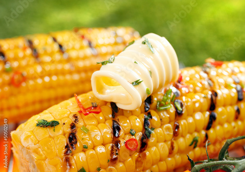 Photo: Grilled corn on the cob with butter Grilled corn on the cob with butter
