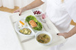 Serving a meal in hospital