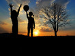 children playing in nature - sunset time