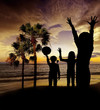 children playing on beach - sunset time