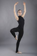Photo: Portrait of young dancer isolated on grey background. Ballerina Portrait of young dancer isolated on grey background. Ballerina