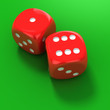 Two red dice on the green